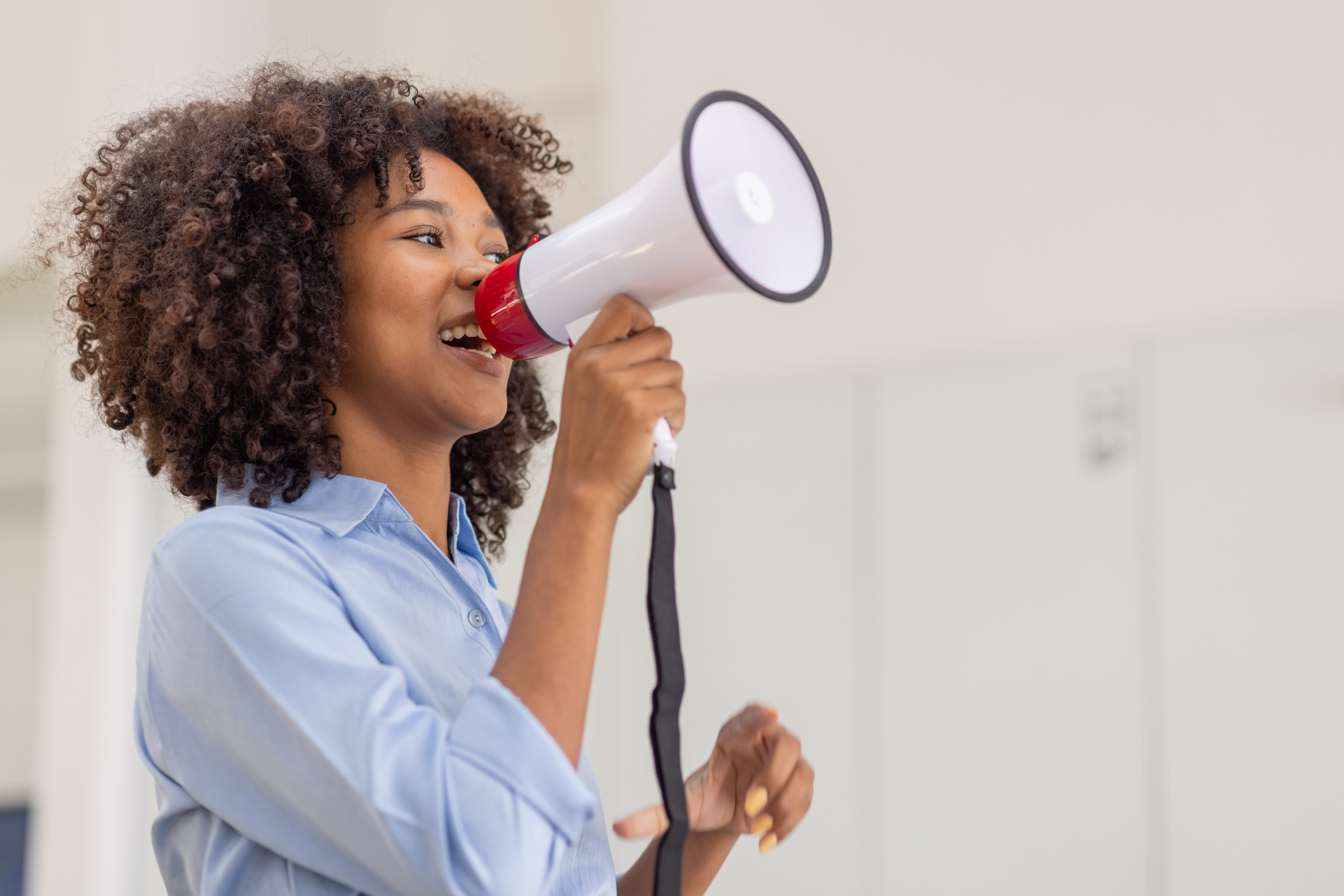 Business black african woman shouting on the megaphone. making Comment, reply, fail, notice and