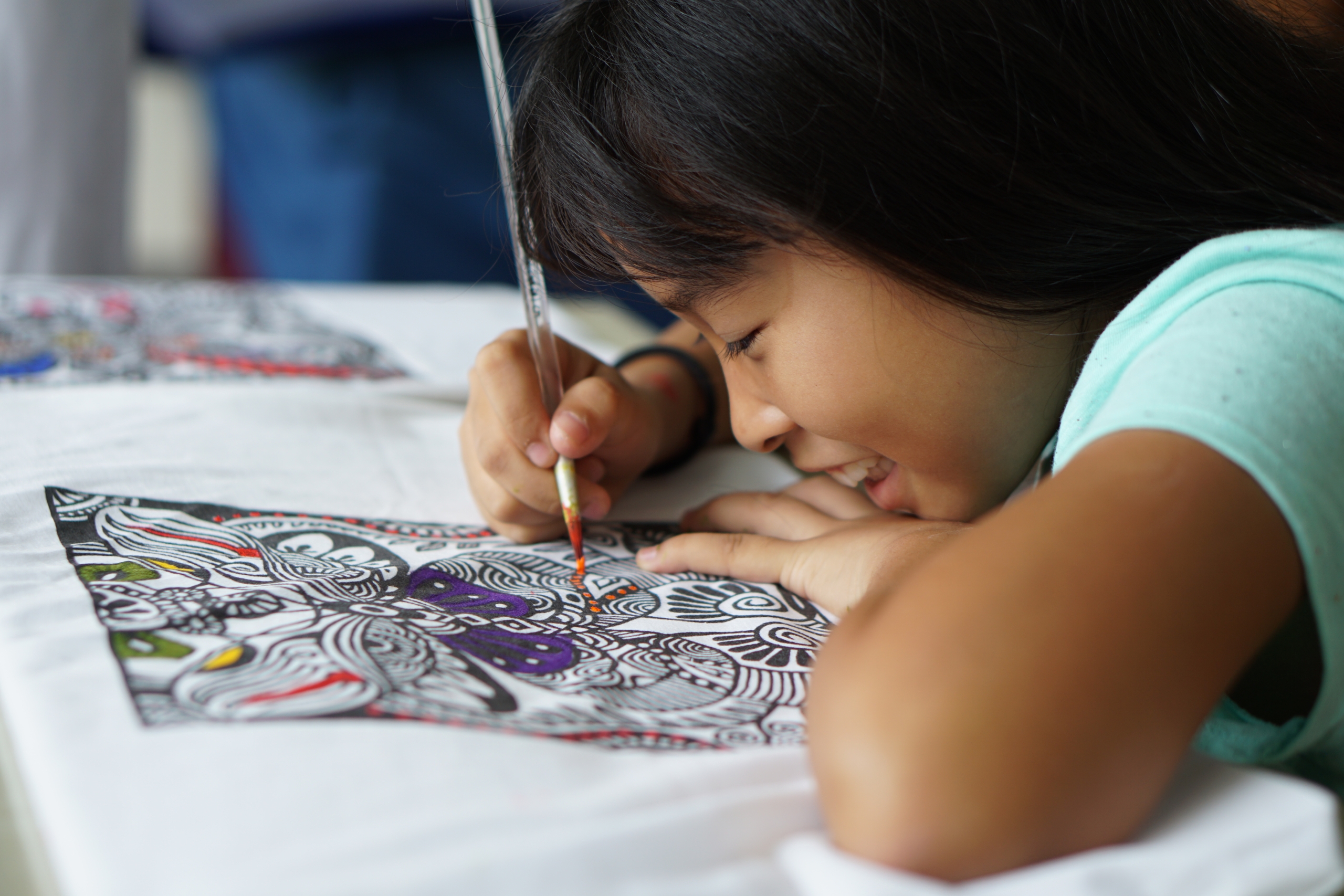 Blue Dragon-A child enjoying arts