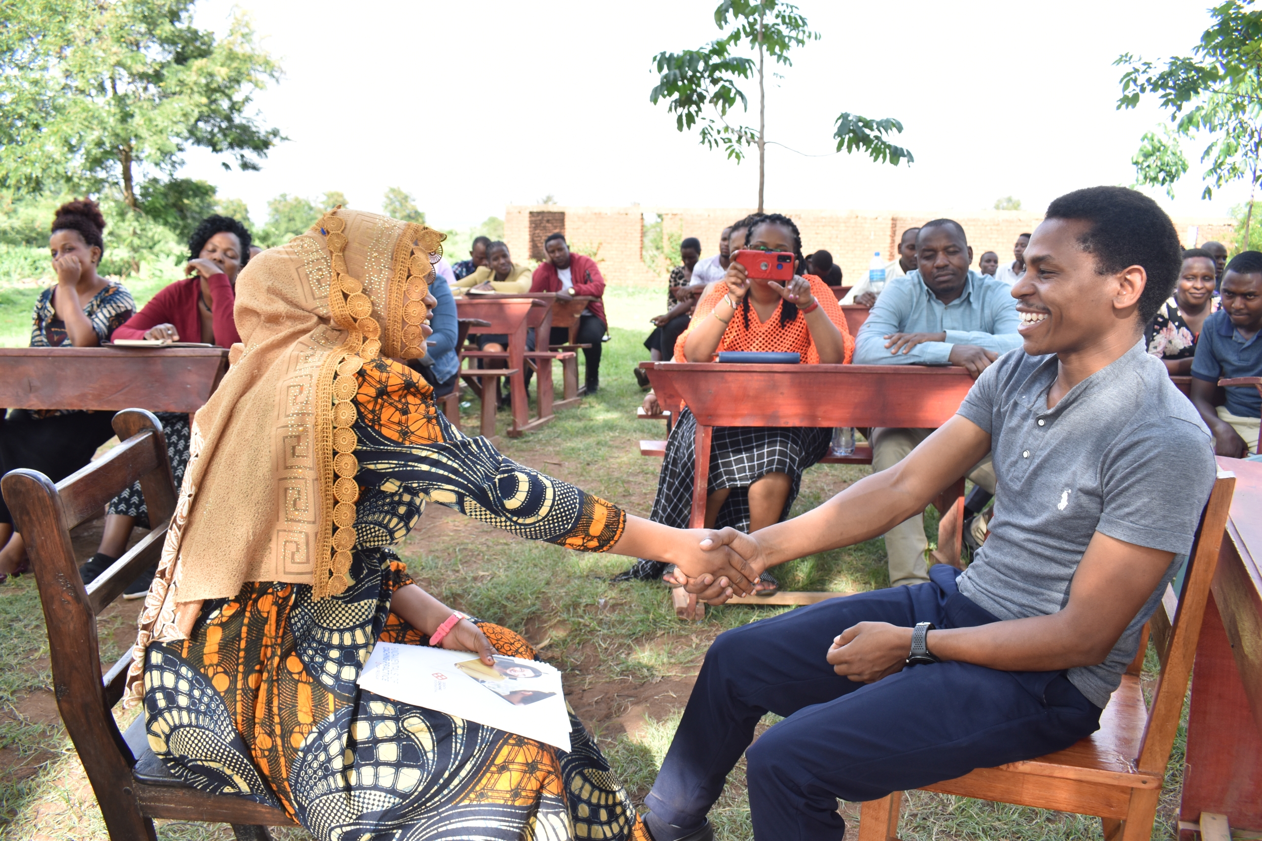 Daudi and Asia conducting a demonstration session on growth coaching (2)