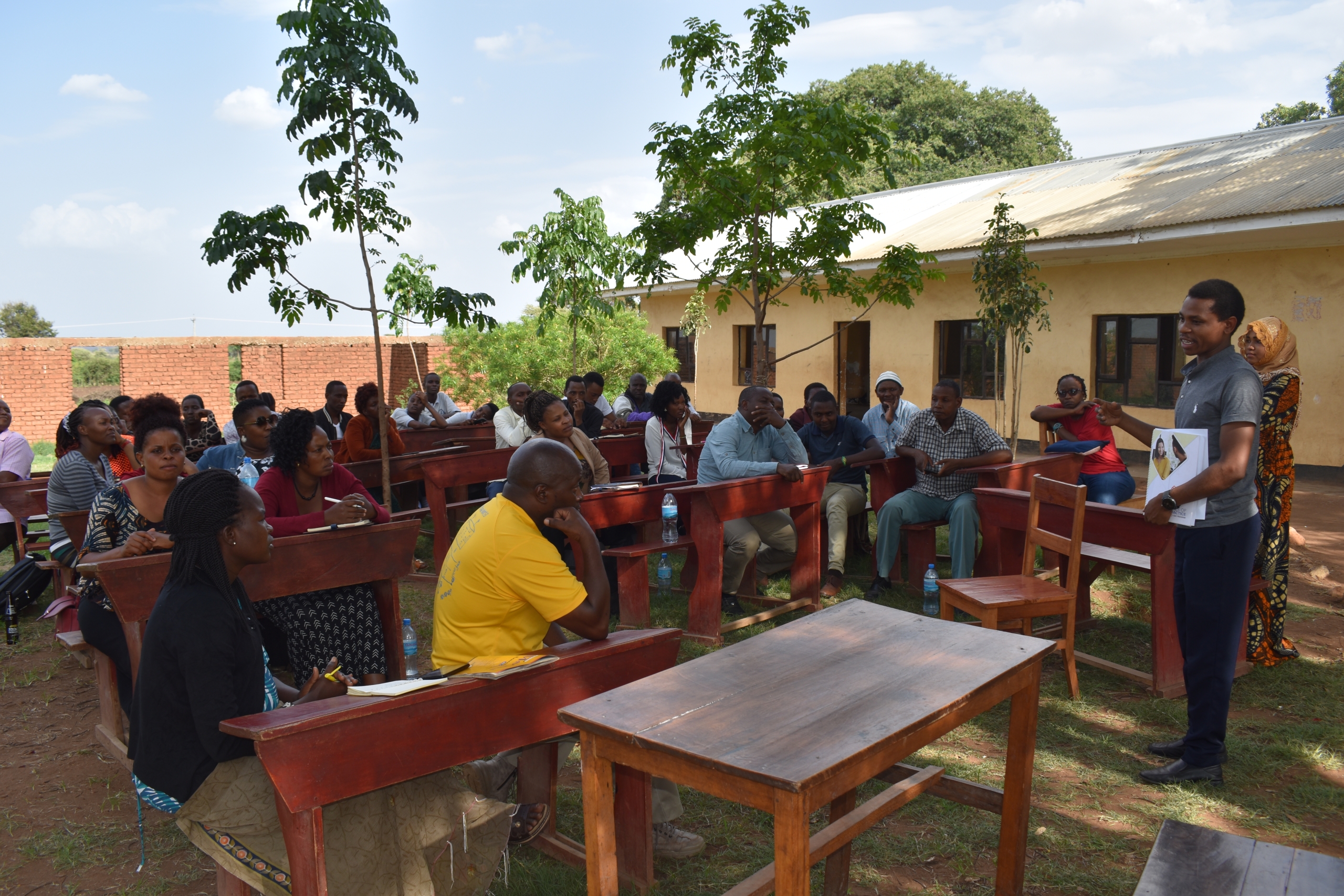 Daudi explaining the impacts they have attained after implementing growth coaching to STC Kenyan team (1)